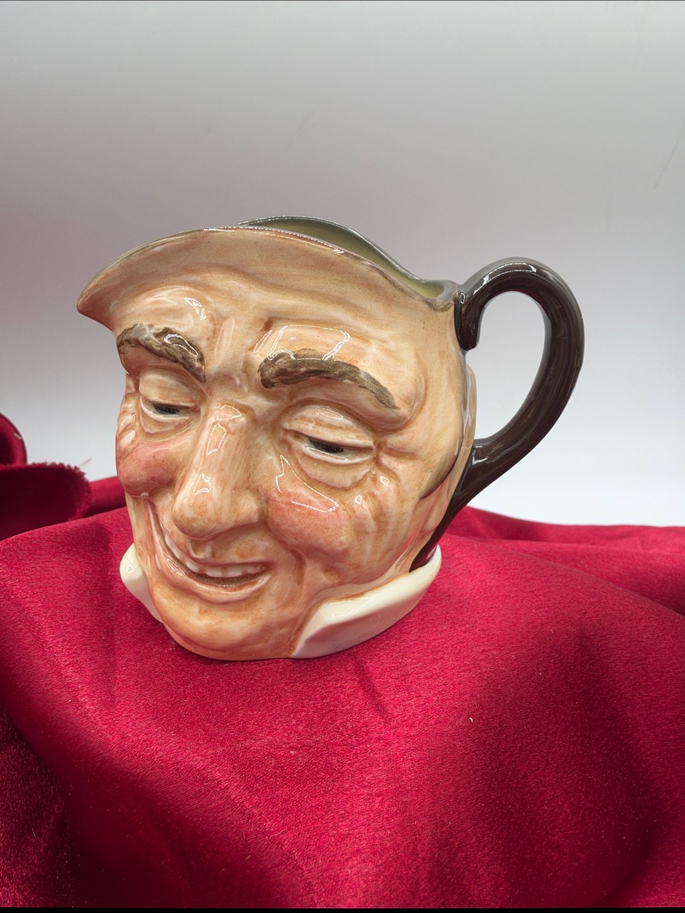 A "Farmer John" character jug by Royal Doulton.